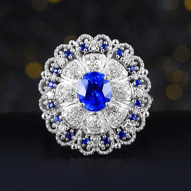 14k Gold 1.23 Ctw Natural Sapphire & Sapphire Ring: Ref:231127001 // gold content:14k gold // ring size:7. 25us // // main gemstone:sapphire // shape:oval // carat weight:1. 15ct // color:blue // treatment:natural // // adjacent gemstone 2 :