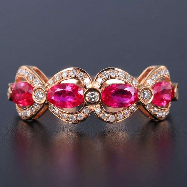 14k Gold 1.25 Ctw Natural Ruby & Diamond Ring: Ref:231127030 // gold content:14k gold // ring size:7. 25us // // main gemstone:ruby // shape:oval // carat weight:1. 06ct // color:red // treatment:natural // // adjacent gemstone 2 : diamond // numb