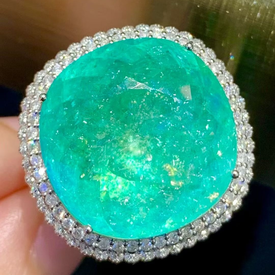 14k Gold 19.5 Ct Natural Paraiba Tourmaline & Diamond Ring: Ref:231127058 // gold content:14k gold // ring size:7. 25us // // main gemstone:paraiba tourmaline // shape:cushion // carat weight:19. 5ct // color:bluish green // treatment:natural // //
