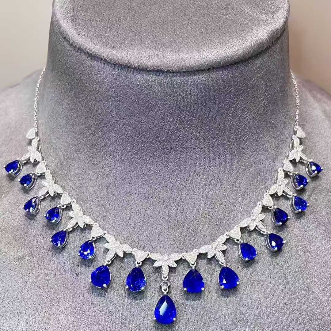 14k Gold 7.6 Ct Natural Sapphire & Diamond Necklace: Ref:231127078 // gold content:14k gold // main gemstone:sapphire // shape:pear // carat weight:7. 6ct // color:blue // treatment:natural // // adjacent gemstone 2 : diamond // shape:round // clarity g