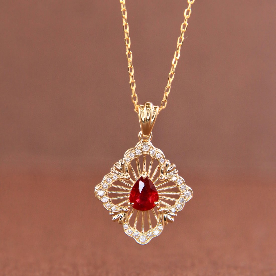 14k Gold 0.41 Ctw Natural Ruby & Diamond Necklace: Ref:231127119 // gold content:14k gold // main gemstone:ruby // shape:pear // carat weight:0. 35ct // color:pigeonblood red // treatment:natural // // adjacent gemstone 2 : diamond // shape:round