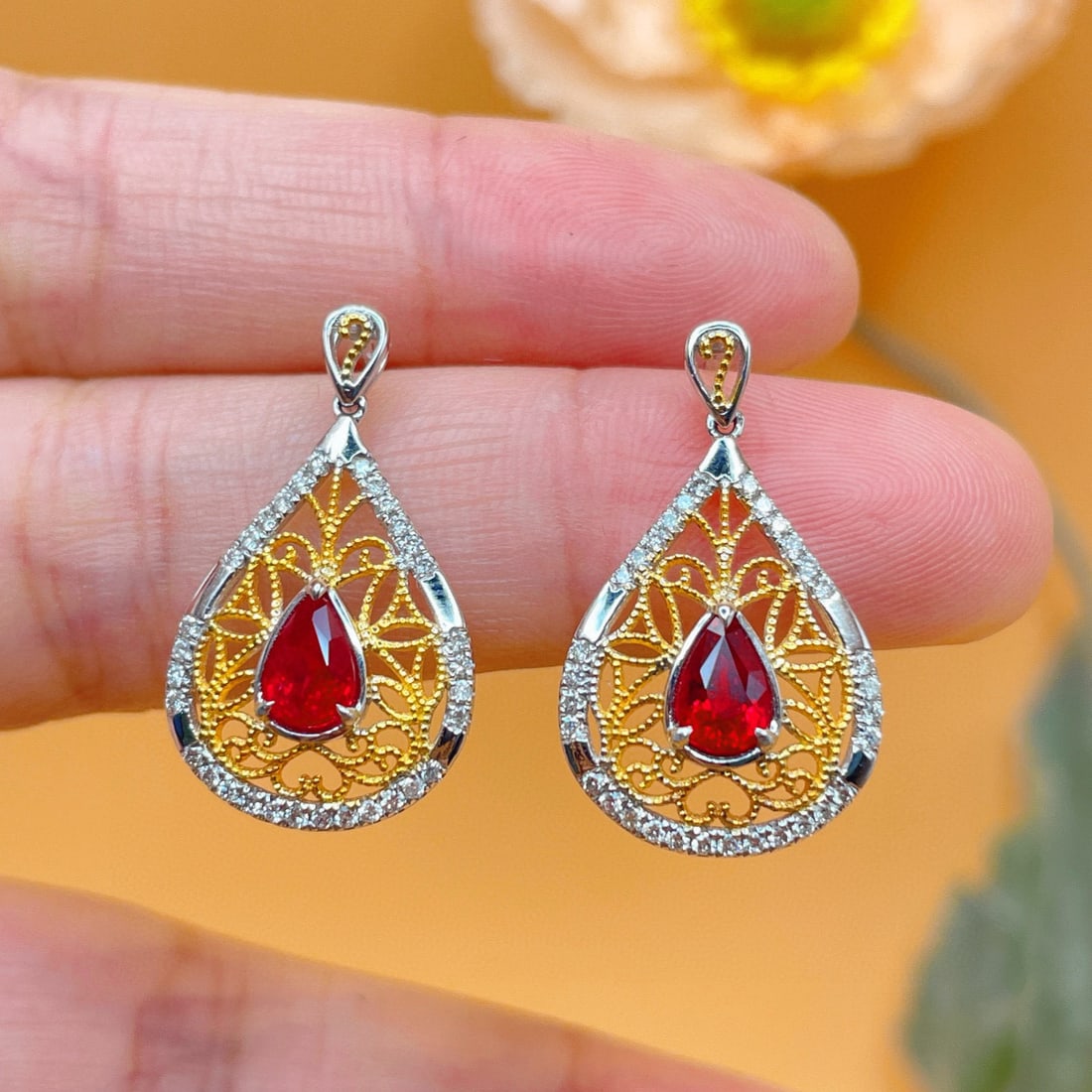 14k Gold 1.61 Ctw Natural Ruby & Diamond Earrings: Ref:231127121 // gold content:14k gold // main gemstone:ruby // shape:pear // carat weight:1. 25ct // color:red // treatment:natural // // adjacent gemstone 2 : diamond // shape:round // carat
