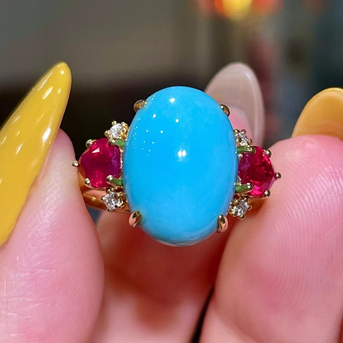 14k Gold 7.85 Ctw Natural Blue Turquoise & Ruby Ring: Ref:231127151 // gold content:14k gold // ring size:7. 25us // // main gemstone:blue turquoise // shape:oval // carat weight:6. 83ct // color:blue // treatment:natural // // adjacent gemstone 2 :