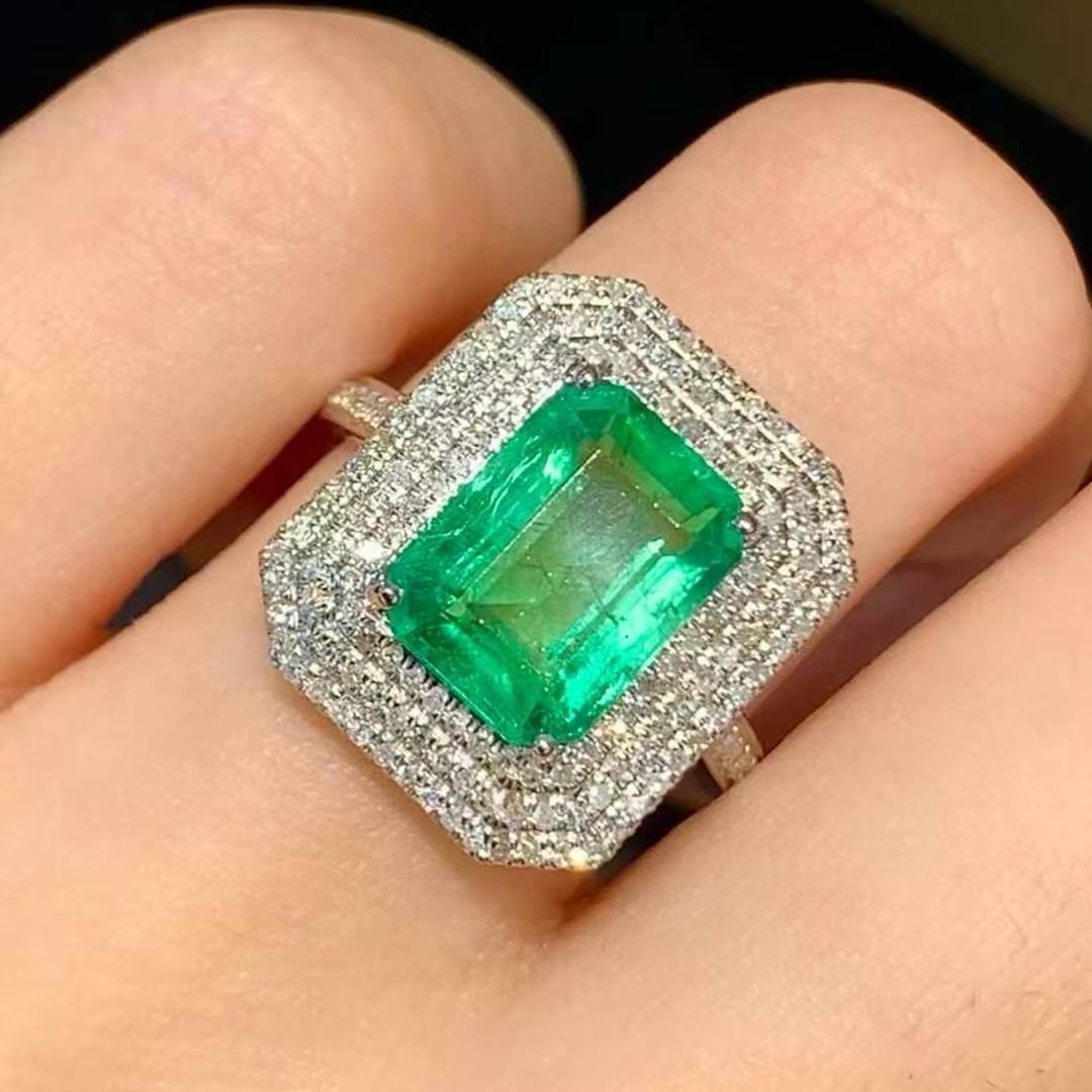 14k Gold 2.8 Ct Natural Emerald & Diamond Ring: Ref:231127173 // gold content:14k gold // ring size:7. 25us // // main gemstone:emerald // shape:octagonal // carat weight:2. 8ct // color:green // treatment:natural // // adjacent gemstone 2 :