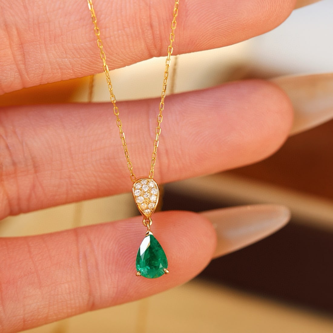 14k Gold 1.10 Ct Vivid Green Natural Emerald & Diamond Pendant( Without Chain ): Ref:231127184 // gold content:14k gold // main gemstone:emerald // shape:pear // carat weight:1. 10ct // color:vivid green // treatment:natural // // adjacent gemstone 2 : diamond // shape:round //