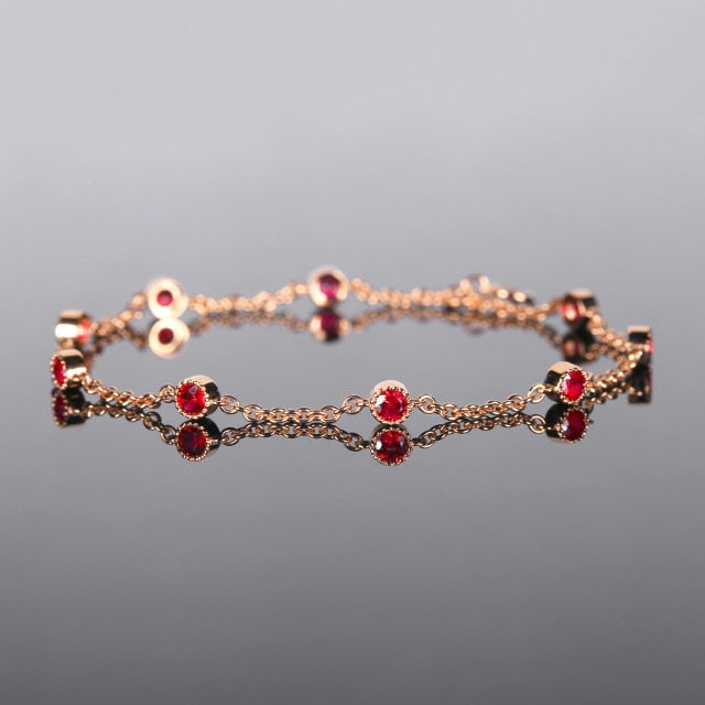14k Gold 0.93 Ct Natural Ruby Bracelet: Ref:231127211 // gold content:14k gold // main gemstone:ruby // shape:round // carat weight:0. 93ct // color:red // treatment:natural // cut grade:g // High Estimate: 3300Condition: NewLow Estimate: