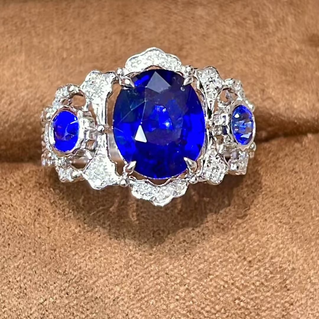 14k Gold 2.71 Ct Natural Sapphire & Diamond Ring: Ref:231127212 // gold content:14k gold // ring size:7. 25us // // main gemstone:sapphire // shape:oval // carat weight:2. 71ct // color:blue // treatment:natural // // adjacent gemstone 2 :