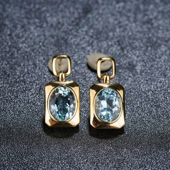 14k Gold 3.11 Ct Natural Aquamarine Earrings: Ref:231127248 // gold content:14k gold // main gemstone:aquamarine // shape:oval // carat weight:3. 11ct // color:santa maria color // treatment:natural // High Estimate: 3000 Condition: New Low Esti