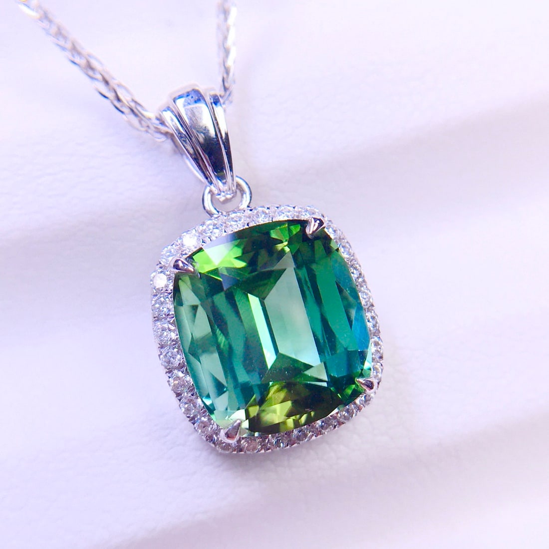 14k Gold 3.95 Ct Natural Tourmaline & Diamond Pendant( Without Chain ): Ref:231128078 // gold content:14k gold // main gemstone:tourmaline // shape:cushion // carat weight:3. 95ct // color:green // treatment:natural // // adjacent gemstone 2 : diamond // shape:round // cl