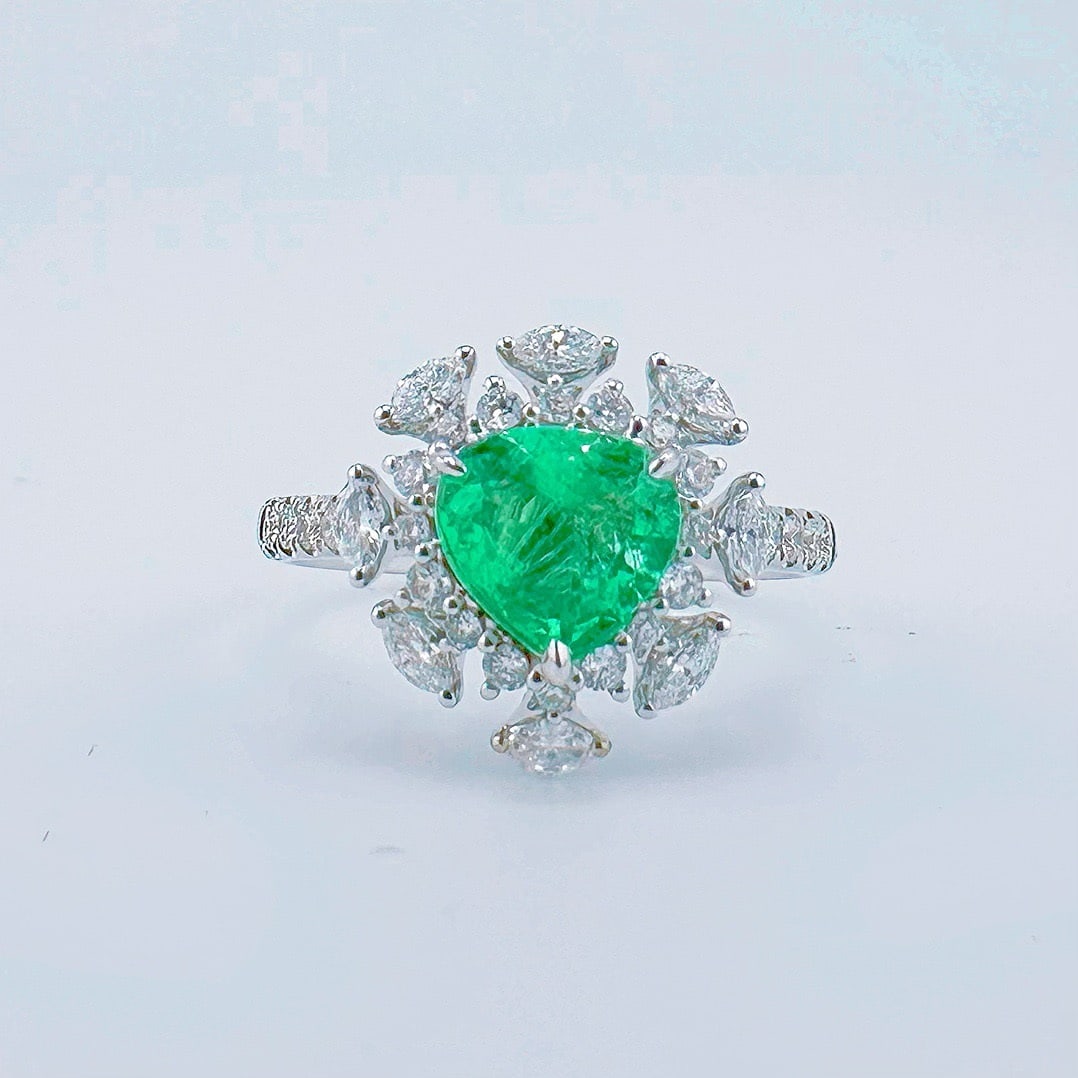 14k Gold 1.63 Ctw Natural Emerald & Diamond Ring: Ref:231128085 // gold content:14k gold // ring size:7. 25us // // main gemstone:emerald // shape:pear // carat weight:1. 02ct // color:green // treatment:natural // // adjacent gemstone 2 : diamond //