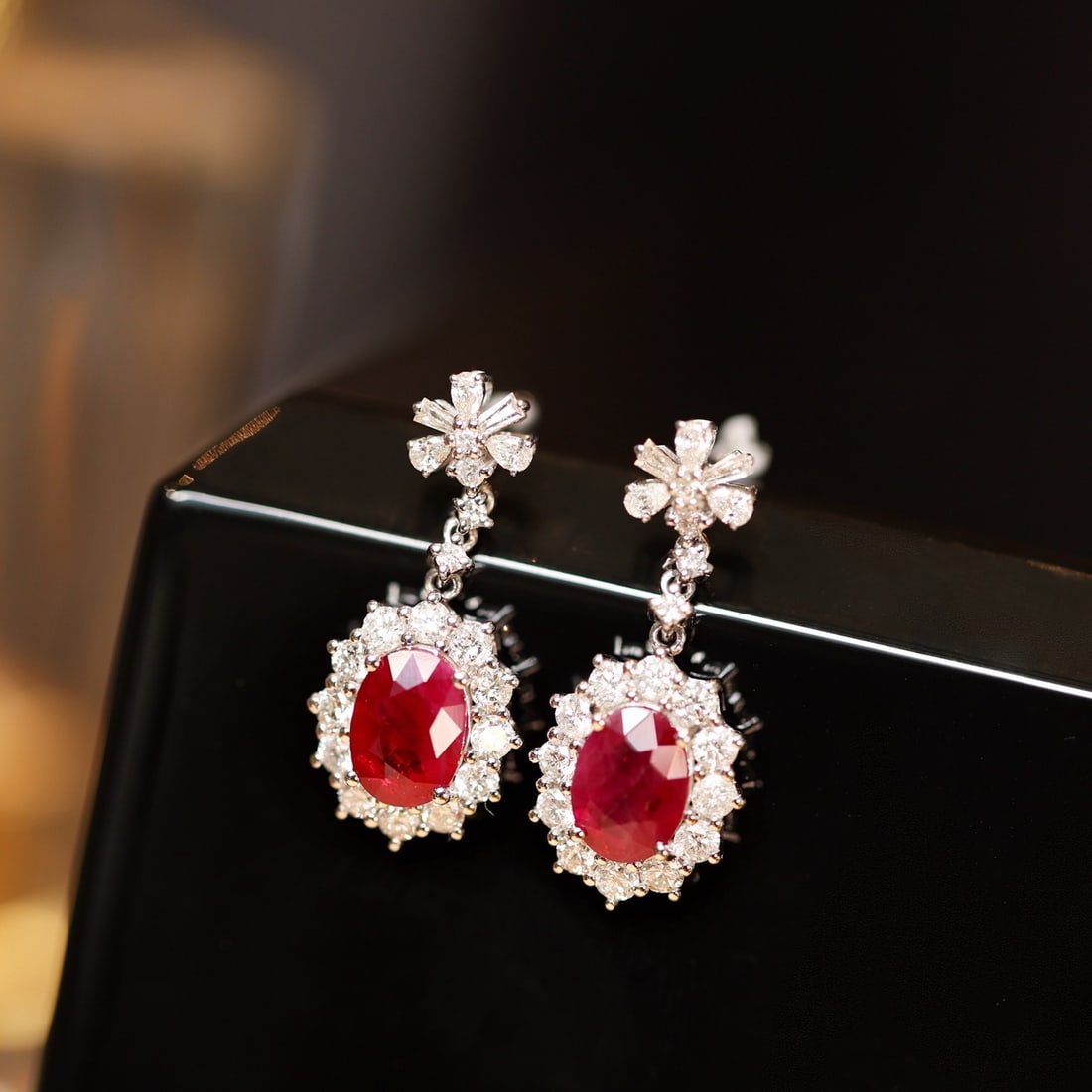 14k Gold 3.38 Ctw Vivid Red Natural Ruby & Diamond Earrings: Ref:231128094 // gold content:14k gold // main gemstone:ruby // shape:oval // carat weight:2. 22ct // color:vivid red // treatment:natural // // adjacent gemstone 2 : diamond // shape:multiple //