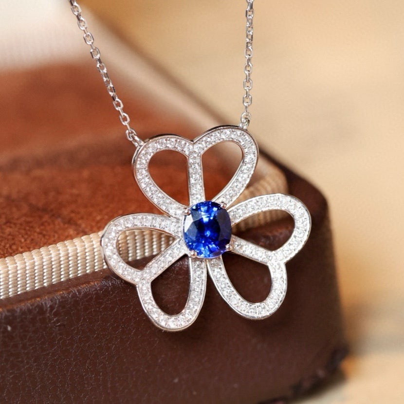 14k Gold 0.84 Ctw Vivid Blue Natural Sapphire & Diamond Necklace: Ref:231128096 // gold content:14k gold // main gemstone:sapphire // shape:oval // carat weight:0. 56ct // color:vivid blue // treatment:natural // // adjacent gemstone 2 : diamond // shape:round //