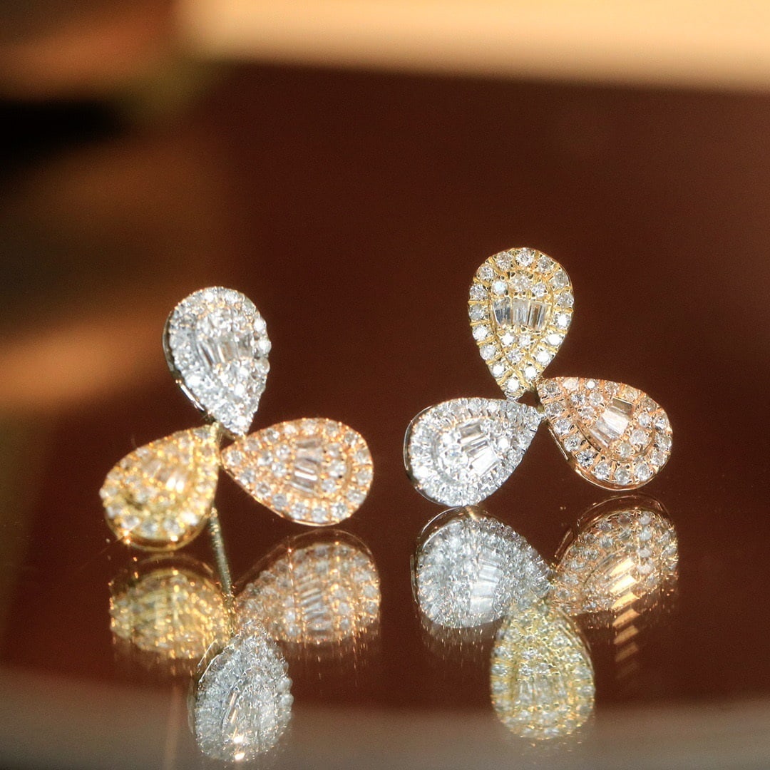 14k Gold 0.66 Ct Natural H Diamond Earrings: Ref:231128098 // gold content:14k gold // main gemstone:diamond // shape:multiple // carat weight:0. 66ct // clarity grade:vs-si // color:h // treatment:natural // Condition: NewLow Estimate: