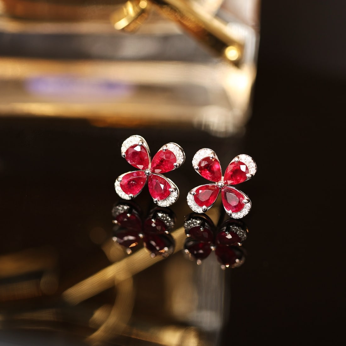14k Gold 1.53 Ctw Vivid Red Natural Ruby & Diamond Earrings: Ref:231128120 // gold content:14k gold // main gemstone:ruby // shape:pear // carat weight:1. 45ct // color:vivid red // treatment:natural // // adjacent gemstone 2 : diamond // shape:round //