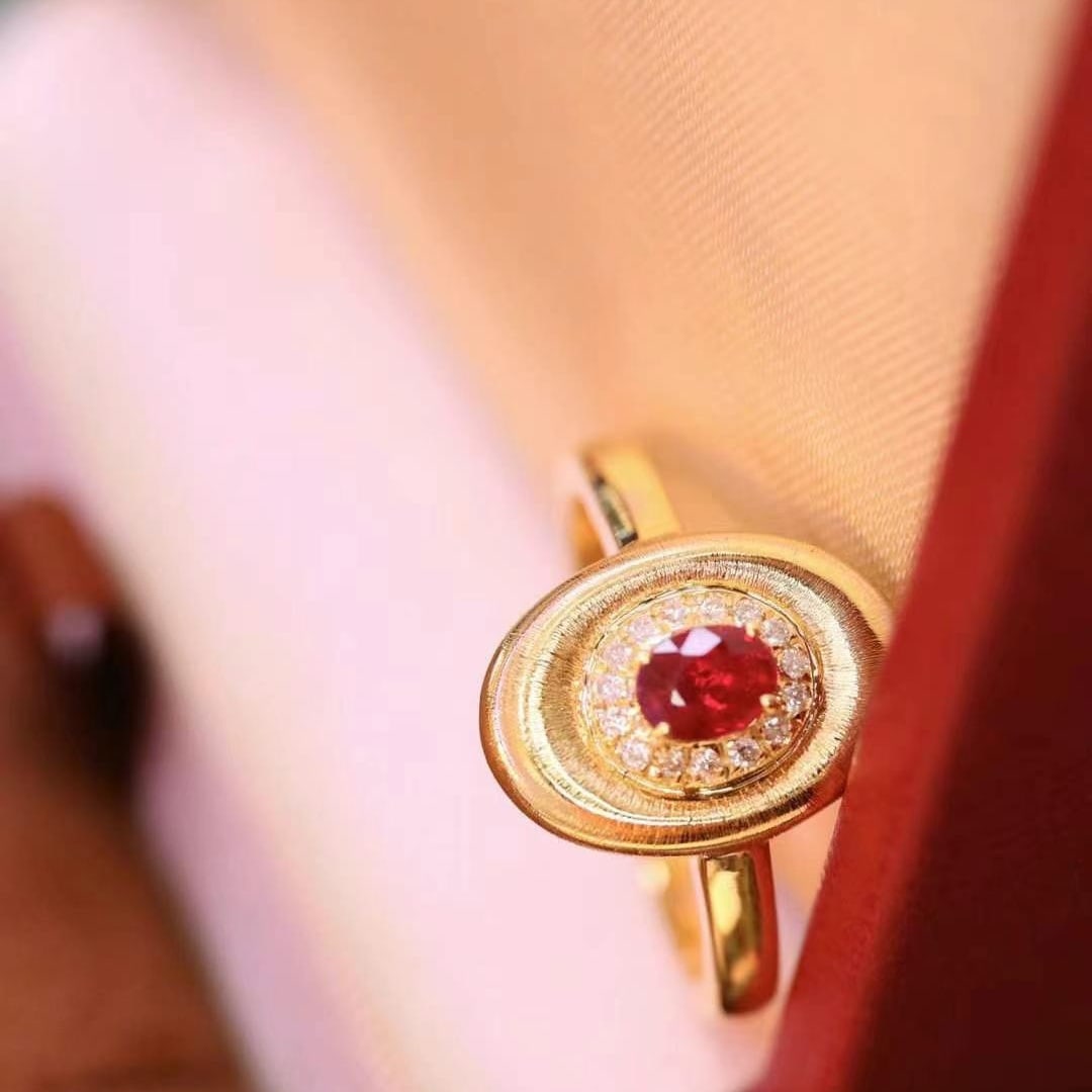14k Gold 0.36 Ctw Vivid Red Natural Ruby & Diamond Ring: Ref:231128170 // gold content:14k gold // ring size:7. 25us // // main gemstone:ruby // shape:oval // carat weight:0. 29ct // color:vivid red // treatment:natural // // adjacent gemstone 2 :