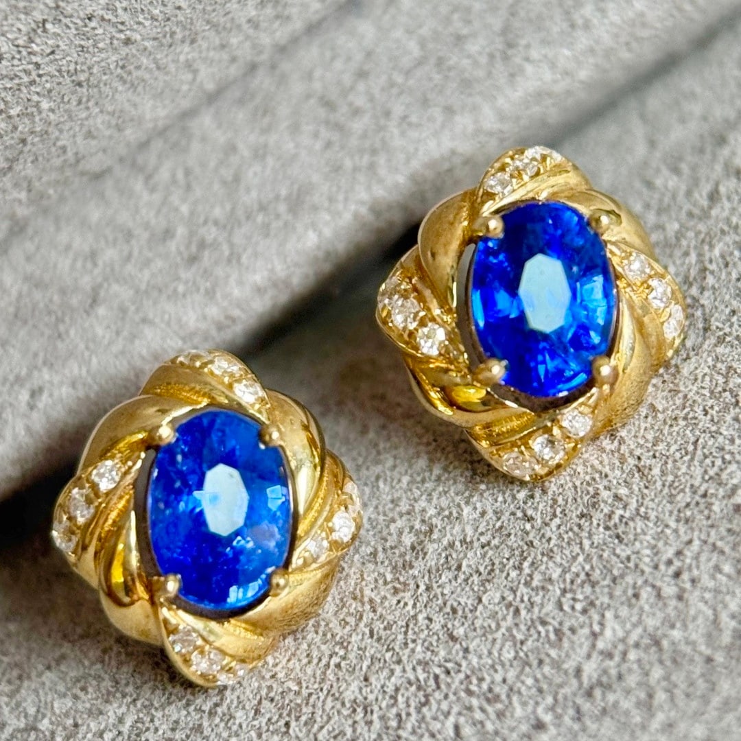 14k Gold 1.61 Ctw Vivid Blue Natural Sapphire & Diamond Earrings: Ref:231128173 // gold content:14k gold // main gemstone:sapphire // shape:oval // carat weight:1. 49ct // color:vivid blue // treatment:natural // // adjacent gemstone 2 : diamond // shape:round //