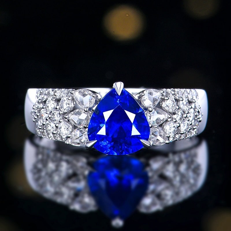 14k Gold 1.66 Ctw Natural Sapphire & Diamond Ring: Ref:231128206 // gold content:14k gold // ring size:7. 25us // // main gemstone:sapphire // shape:pear // carat weight:1. 28ct // color:royal blue // treatment:natural // // adjacent gemstone 2 :