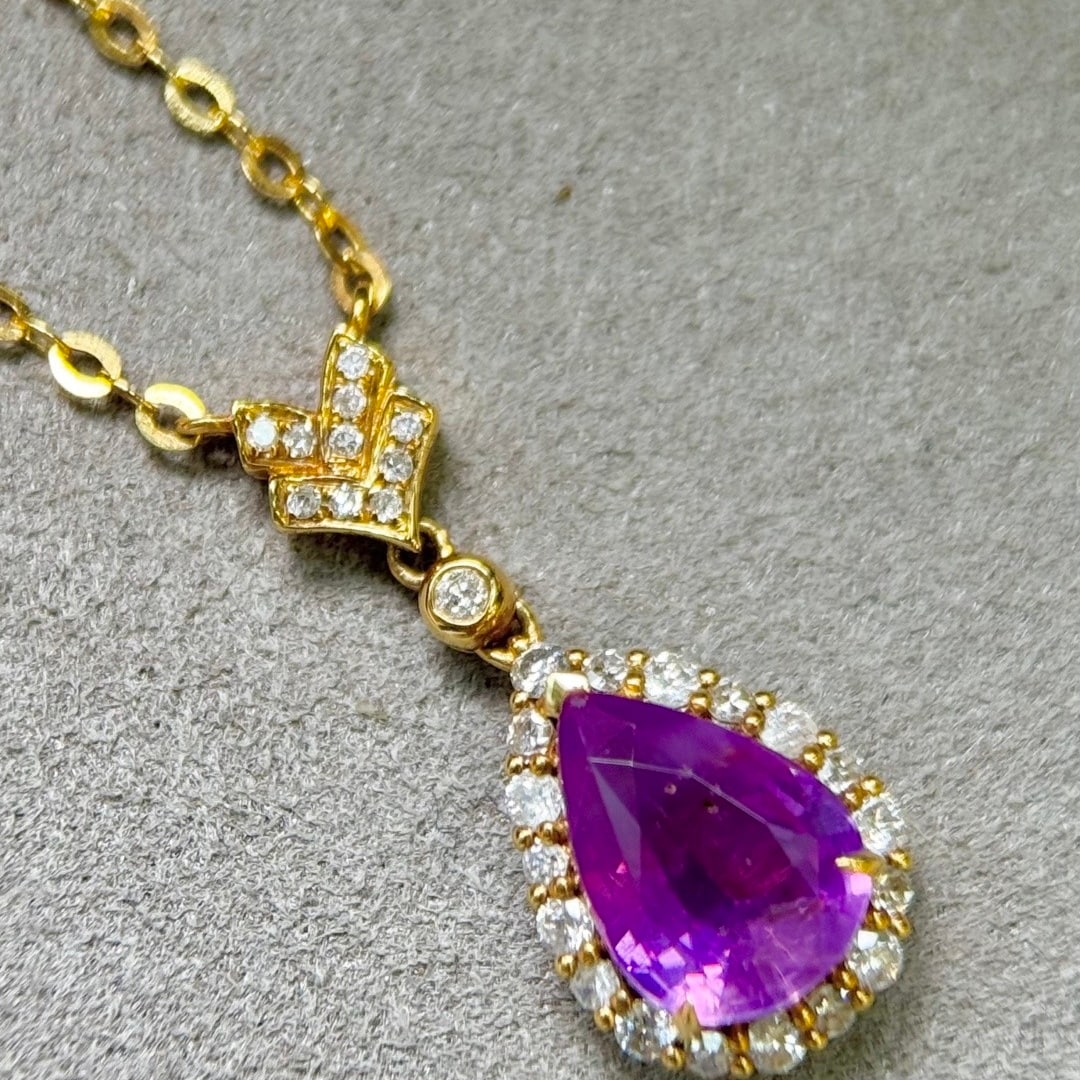 14k Gold 1.90 Ctw Natural Sapphire & Diamond Necklace: Ref:231128207 // gold content:14k gold // main gemstone:sapphire // shape:pear // carat weight:1. 66ct // color:purple // treatment:natural // // adjacent gemstone 2 : diamond // shape:round // carat