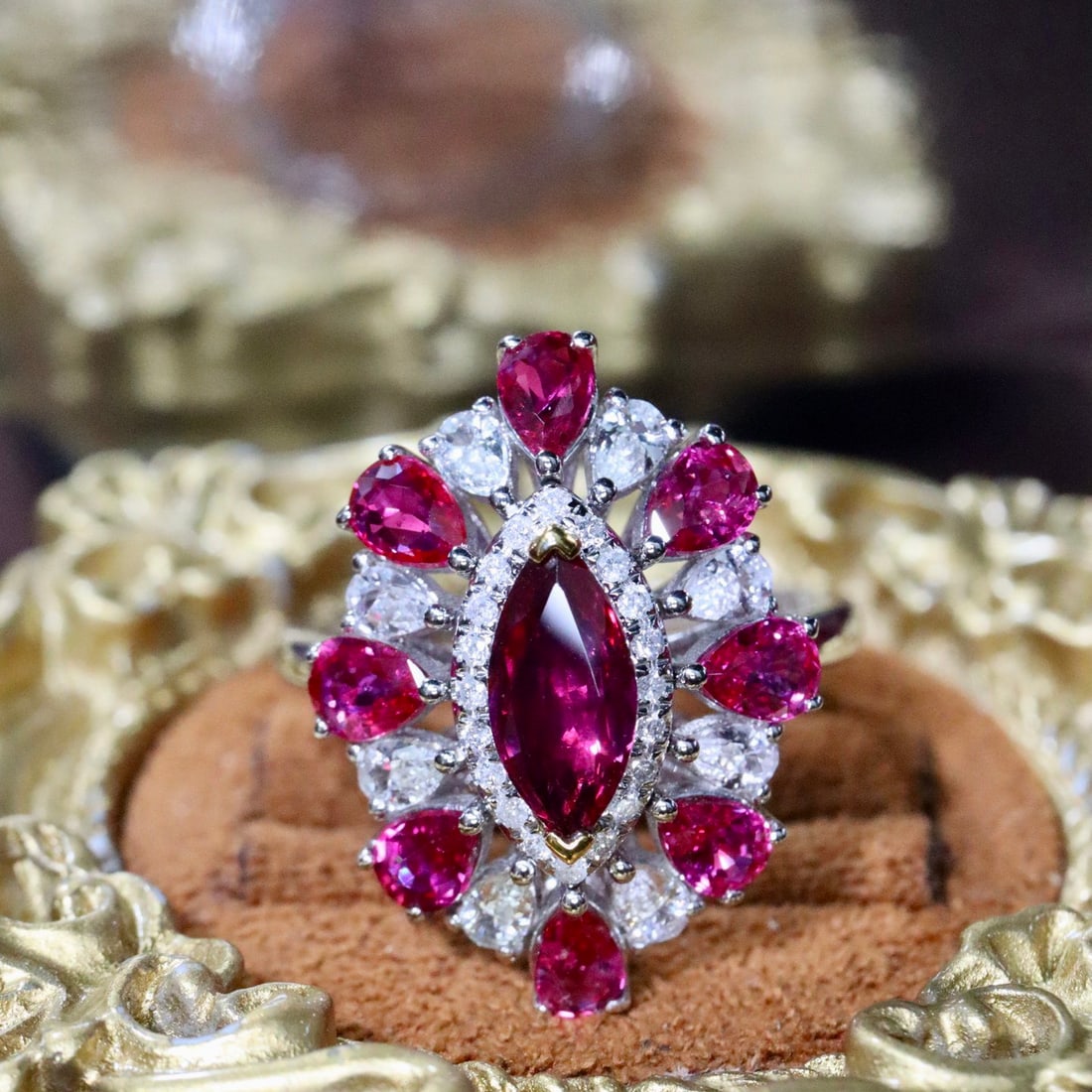 14k Gold 0.86 Ctw Natural Ruby & Diamond Ring: Ref:231128280 // gold content:14k gold // ring size:7. 25us // // main gemstone:ruby // shape:marquise // carat weight:0. 76ct // color:red // treatment:natural // // adjacent gemstone 2 : diamond