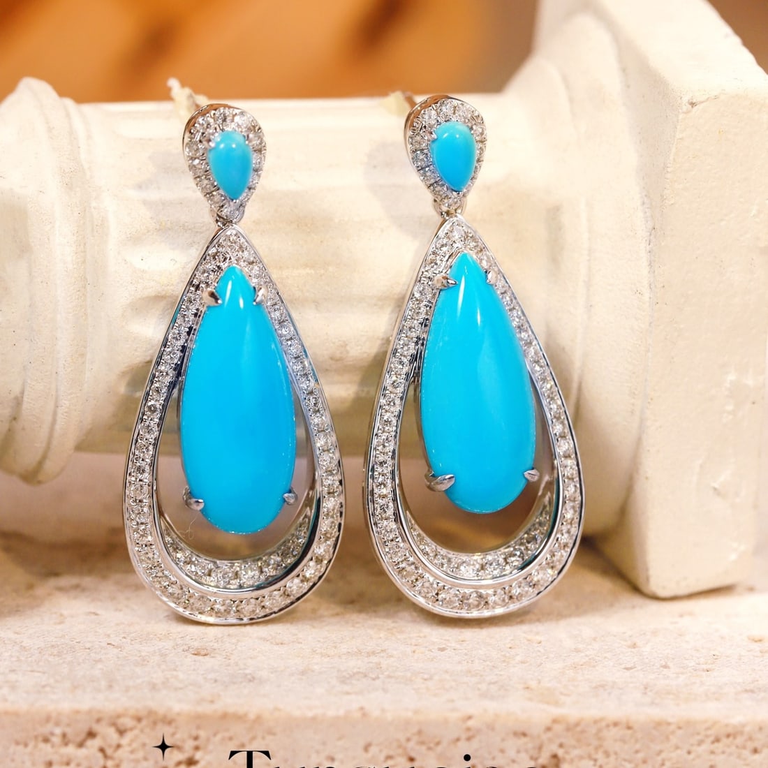 14k Gold 7.47 Ctw Natural Blue Turquoise & Diamond Earrings: Ref:231128291 // gold content:14k gold // main gemstone:blue turquoise // shape:pear // carat weight:6. 58ct // color:blue // treatment:natural // // adjacent gemstone 2 : diamond // shape:round //