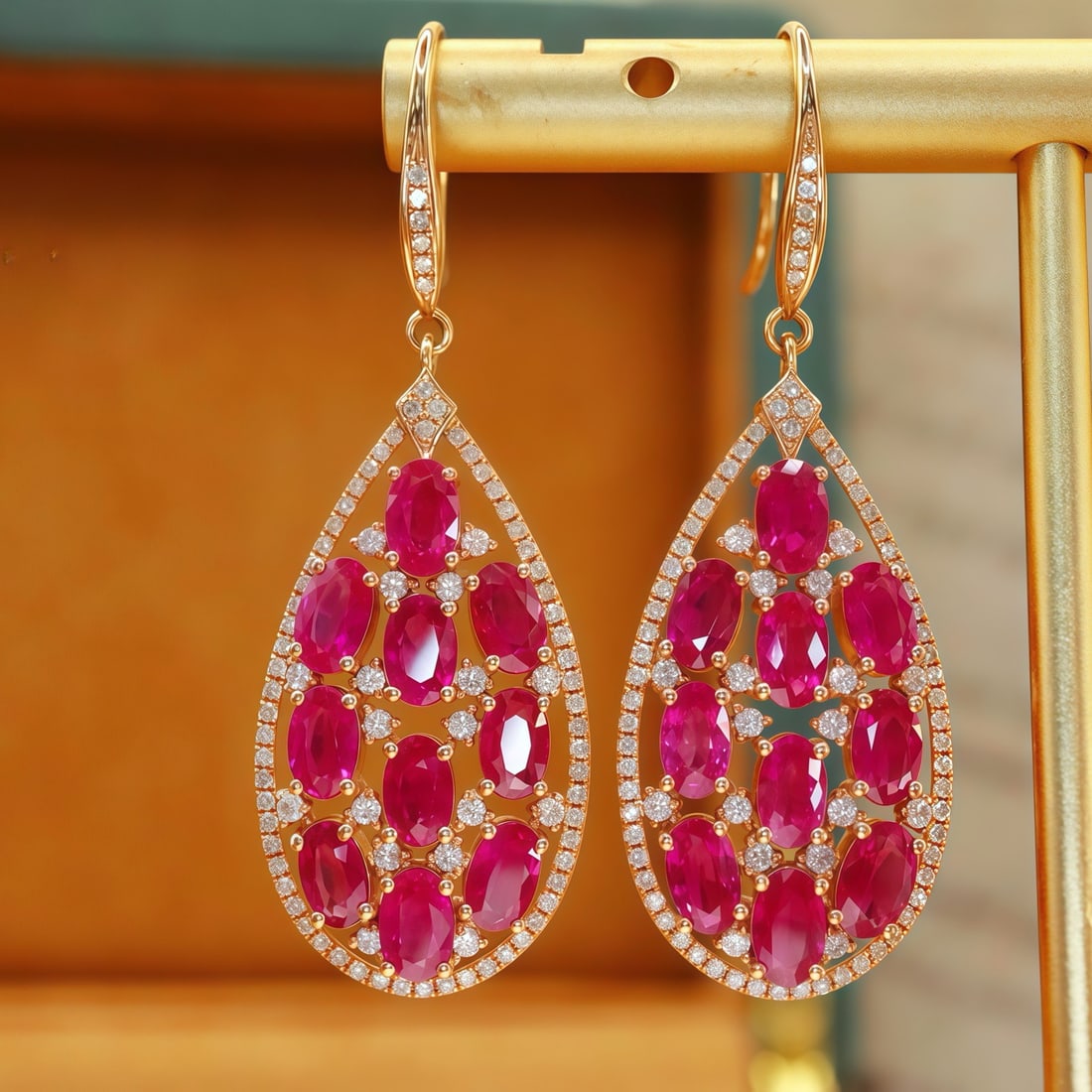 14k Gold 6.33 Ctw Natural Ruby & Diamond Earrings: Ref:231128313 // gold content:14k gold // main gemstone:ruby // shape:oval // carat weight:5. 55ct // color:red // treatment:natural // // adjacent gemstone 2 : diamond // number of stones:176 //