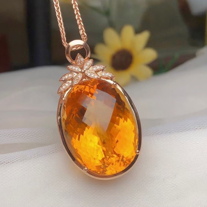 14k Gold 40.50 Ct Natural Citrine & Diamond Pendant( Without Chain ): Ref:231128325 // gold content:14k gold // main gemstone:citrine // shape:oval // carat weight:40. 50ct // color:yellow // treatment:natural // // adjacent gemstone 2 : diamond // number of