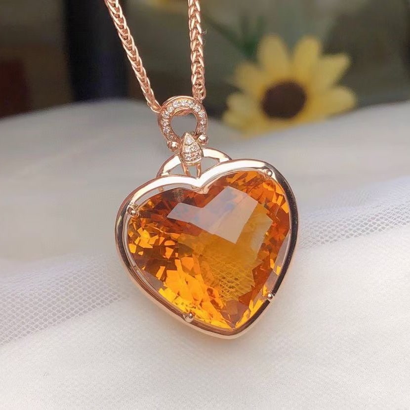 14k Gold 23.02 Ct Natural Citrine & Diamond Pendant( Without Chain ): Ref:231128348 // gold content:14k gold // main gemstone:citrine // shape:heart // carat weight:23. 02ct // color:yellow // treatment:natural // // adjacent gemstone 2 : diamond // number of