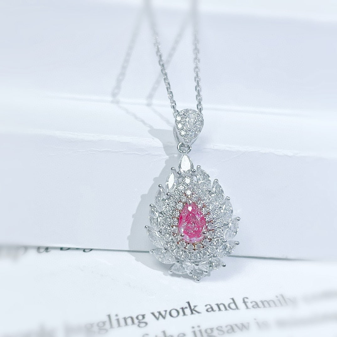 14k Gold 1.33 Ctw Natural Pink Diamond & Diamond Necklace: Ref:231128365 // gold content:14k gold // main gemstone:pink diamond // shape:pear // carat weight:0. 36ct // color:pink // treatment:natural // // adjacent gemstone 2 : diamond // shape:multiple