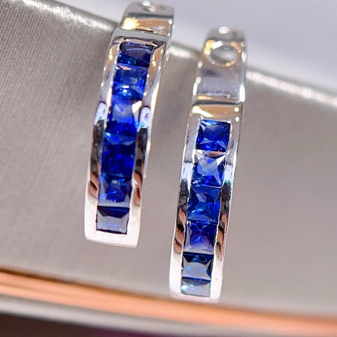 14k Gold 2.04 Ct Natural Sapphire Earrings: Ref:230941083 // gold content:14k gold // main gemstone:sapphire // shape:princess // carat weight:2. 04ct // color:royal blue // treatment:natural // Condition: NewLow Estimate: 2100.00High