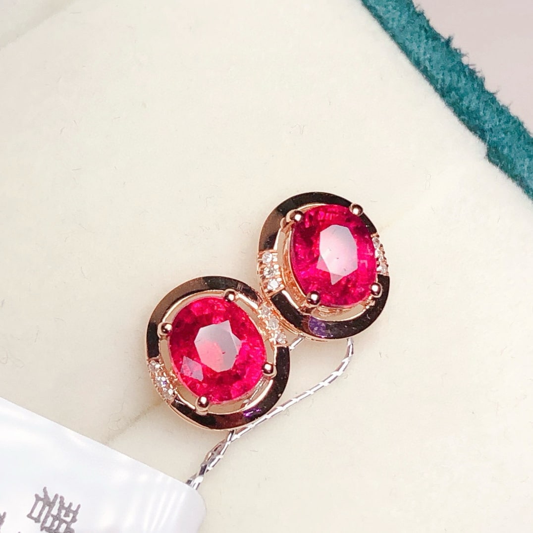 14k Gold 1.6 Ct Natural Tourmaline & Diamond Earrings: Ref:230941144 // gold content:14k gold // main gemstone:tourmaline // shape:oval // carat weight:1. 6ct // color:red // treatment:natural // // adjacent gemstone 2 : diamond // number of stones:12