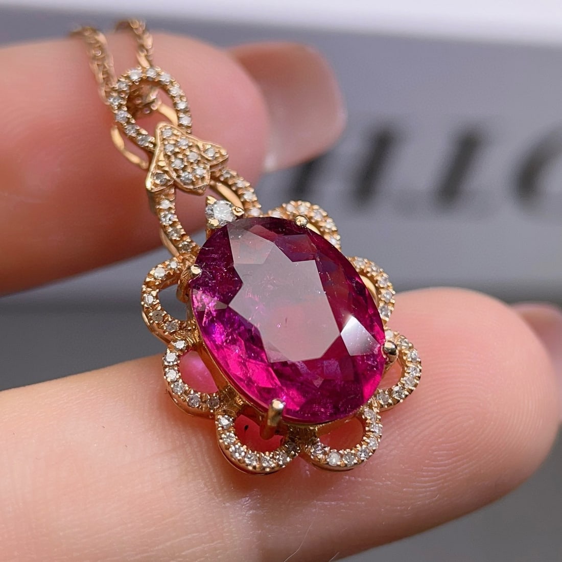 14k Gold 6 Ct Natural Tourmaline & Diamond Pendant( Without Chain ): Ref:230941202 // gold content:14k gold // main gemstone:tourmaline // shape:oval // carat weight:6ct // color:red // treatment:natural // // adjacent gemstone 2 : diamond // number of stones:74 //