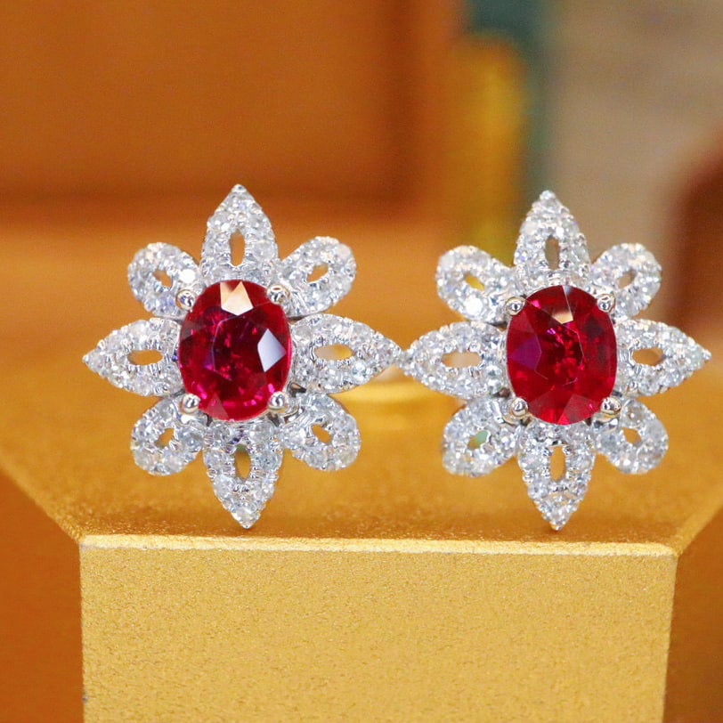 14k Gold 0.91 Ctw Natural Ruby & Diamond Earrings: Ref:230942024 // gold content:14k gold // main gemstone:ruby // shape:oval // carat weight:0. 62ct // color:pigeonblood red // treatment:natural // // adjacent gemstone 2 : diamond // number of stones