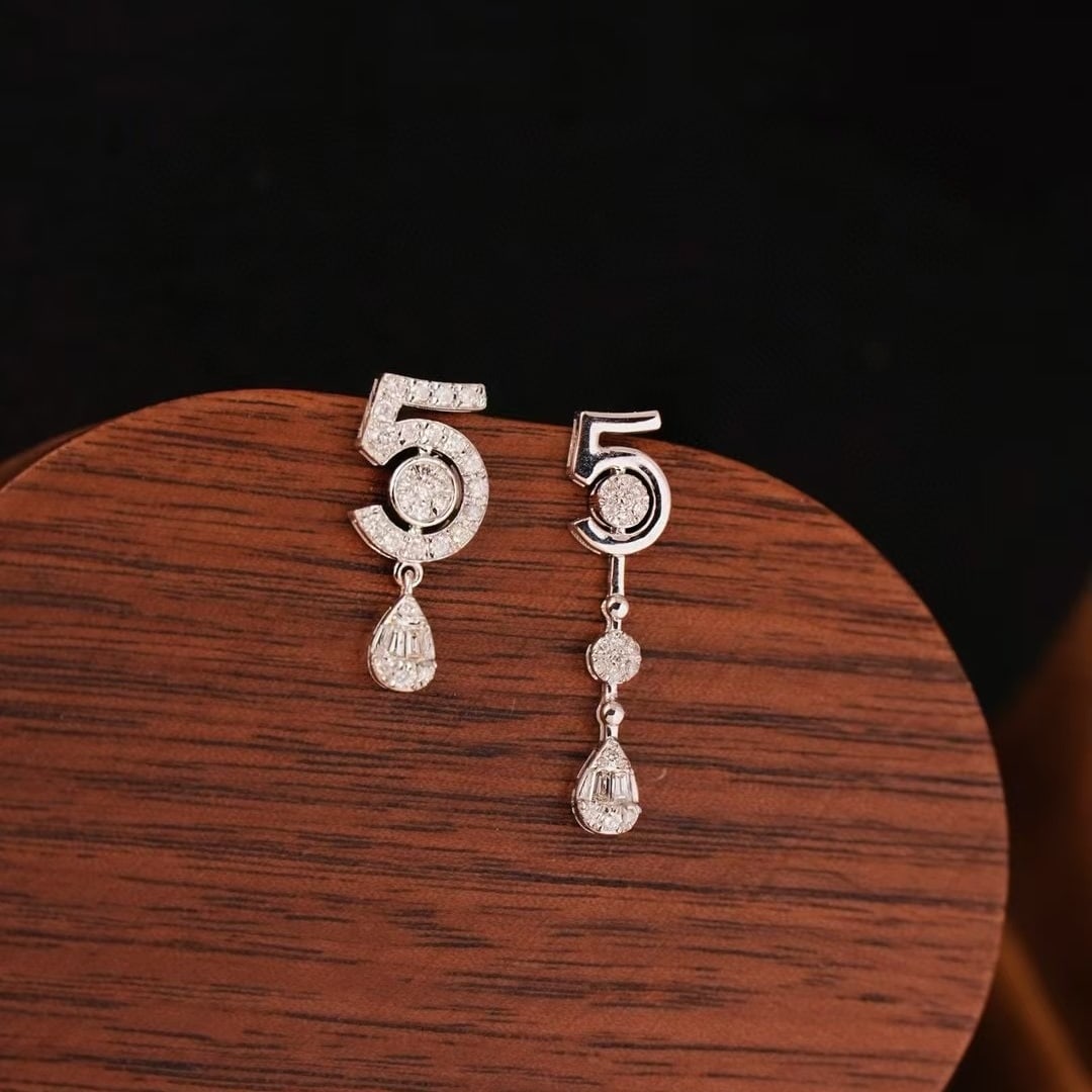 14k Gold 0.48 Ct Natural H Diamond Earrings: Ref:230942297 // gold content:14k gold // main gemstone:diamond // shape:multiply // carat weight:0. 48ct // clarity grade:vs-si // color:h // treatment:natural // Condition: NewLow Estimate: