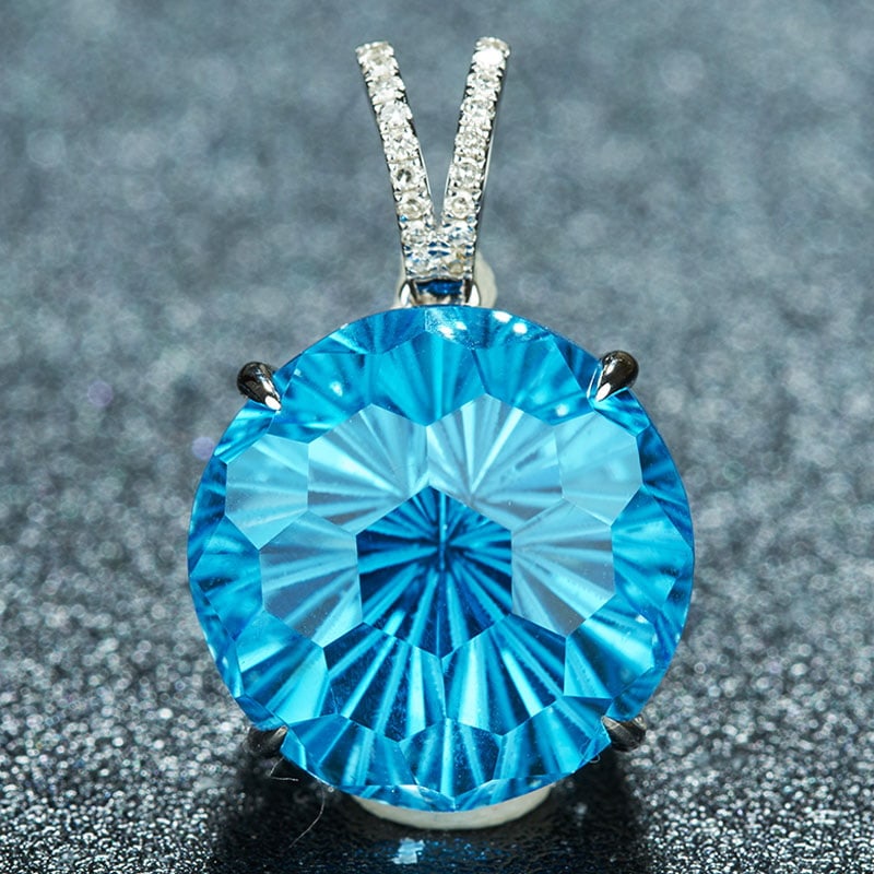 14k Gold 14.95 Ct Natural Topaz & Diamond Pendant( Without Chain ): Ref:230939030 // gold content:14k gold // main gemstone:topaz // shape:round // carat weight:14. 95ct // color:blue // treatment:natural // cut grade:g // // adjacent gemstone 2 : diamond // number of