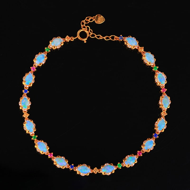 14k Gold 2.78 Ctw Natural Opal & Diamond Bracelet: Ref:230939033 // gold content:14k gold // main gemstone:opal // shape:oval // carat weight:2. 4ct // color:white // treatment:natural // // adjacent gemstone 2 : diamond // number of stones:128 // sha