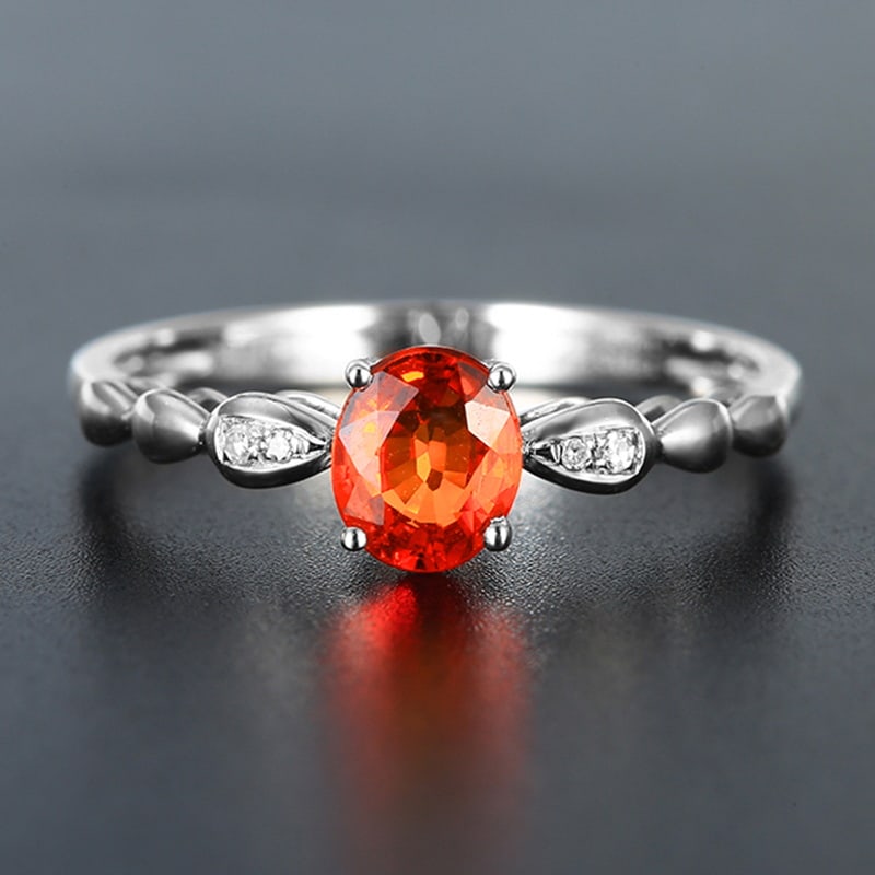 14k Gold 0.69 Ctw Natural Sapphire & Diamond Ring: Ref:230939040 // gold content:14k gold // ring size:7. 25us // // main gemstone:sapphire // shape:oval // carat weight:0. 68ct // color:orange // treatment:natural // // adjacent gemstone 2 : diamond