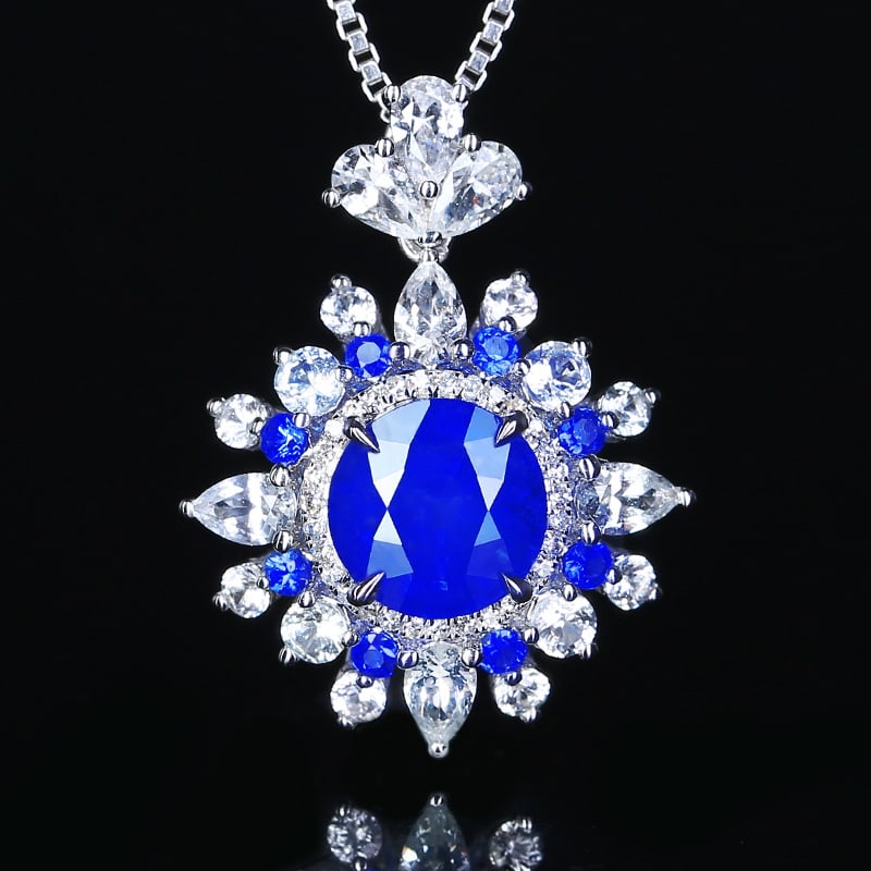 14k Gold 2.72 Ctw Natural Sapphire & Diamond Pendant( Without Chain ): Ref:230939041 // gold content:14k gold // main gemstone:sapphire // shape:round // carat weight:2. 64ct // color:blue // treatment:natural // // adjacent gemstone 2 : diamond // number of stones:39 //