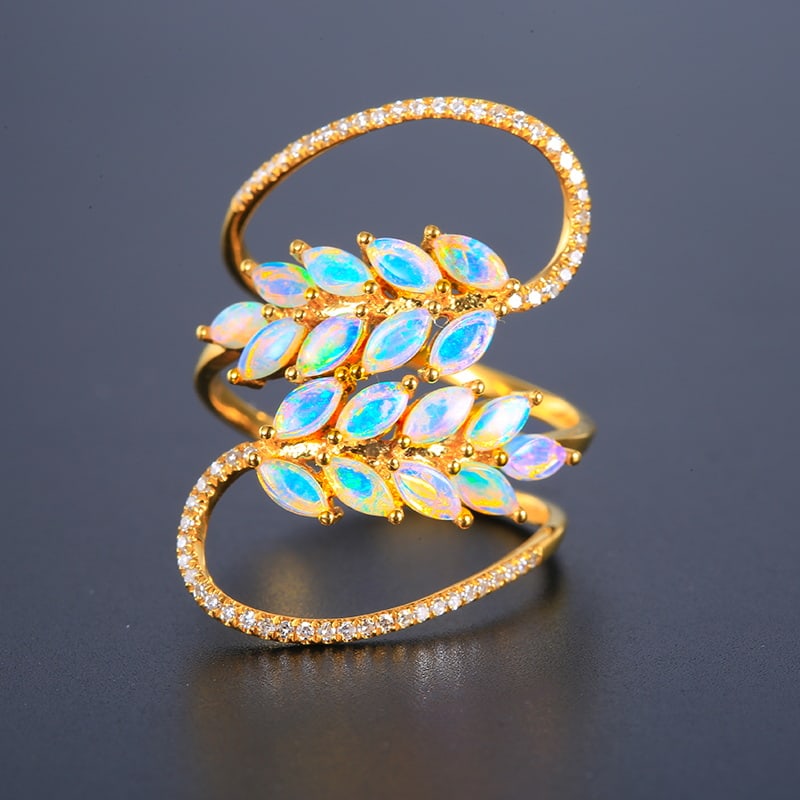 14k Gold 0.84 Ctw Natural Opal & Diamond Ring: Ref:230939043 // gold content:14k gold // ring size:7. 25us // // main gemstone:opal // shape:marquise // carat weight:0. 66ct // color:white // treatment:natural // // adjacent gemstone 2 :