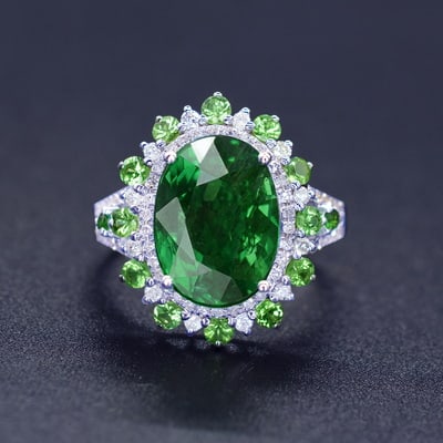 14k Gold 6.40 Ctw Natural Tsavorite & Diamond Ring: Ref:230939051 // gold content:14k gold // ring size:7. 25us // // main gemstone:tsavorite // shape:oval // carat weight:6. 03ct // color:green // treatment:natural // // adjacent gemstone 2 : diamond