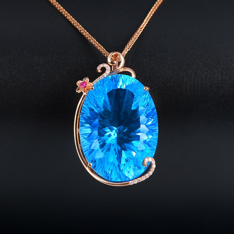 14k Gold 36.74 Ctw Natural Topaz & Diamond Pendant( Without Chain ): Ref:230939066 // gold content:14k gold // main gemstone:topaz // shape:oval // carat weight:36. 68ct // color:blue // treatment:natural // // adjacent gemstone 2 : diamond // number of stones:20 //