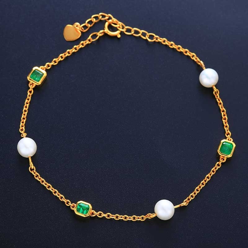 14k Gold 3.47 Ctw Natural Emerald & Pearl Bracelet: Ref:230939067 // gold content:14k gold // main gemstone:emerald // shape:octagonal // carat weight:0. 6ct // color:green // treatment:natural // // adjacent gemstone 2 : pearl // number of stones:3