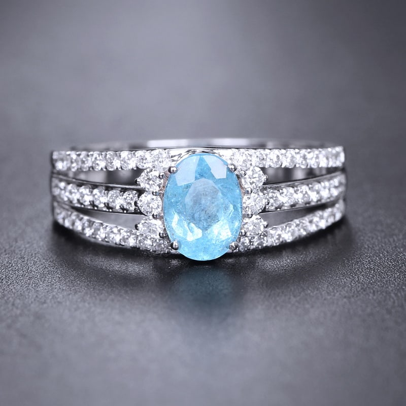 14k Gold 1.28 Ctw Natural Paraiba Tourmaline & Diamond Ring: Ref:230939073 // gold content:14k gold // ring size:7. 25us // // main gemstone:paraiba tourmaline // shape:oval // carat weight:0. 86ct // color:blue // treatment:natural // // adjacent gemstone