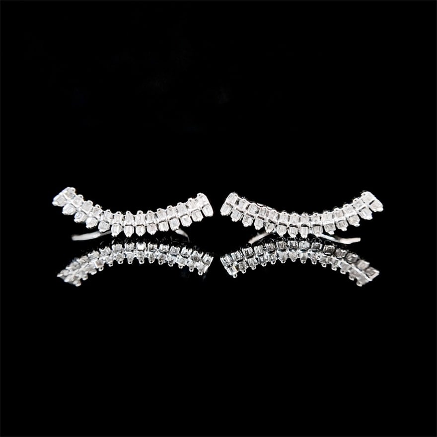 14k Gold 0.2 Ct Natural H Diamond Earrings: Ref:230939090 // gold content:14k gold // main gemstone:diamond // shape:baguette // carat weight:0. 2ct // clarity grade:vs-si // color:h // treatment:natural // Condition: NewLow Estimate: