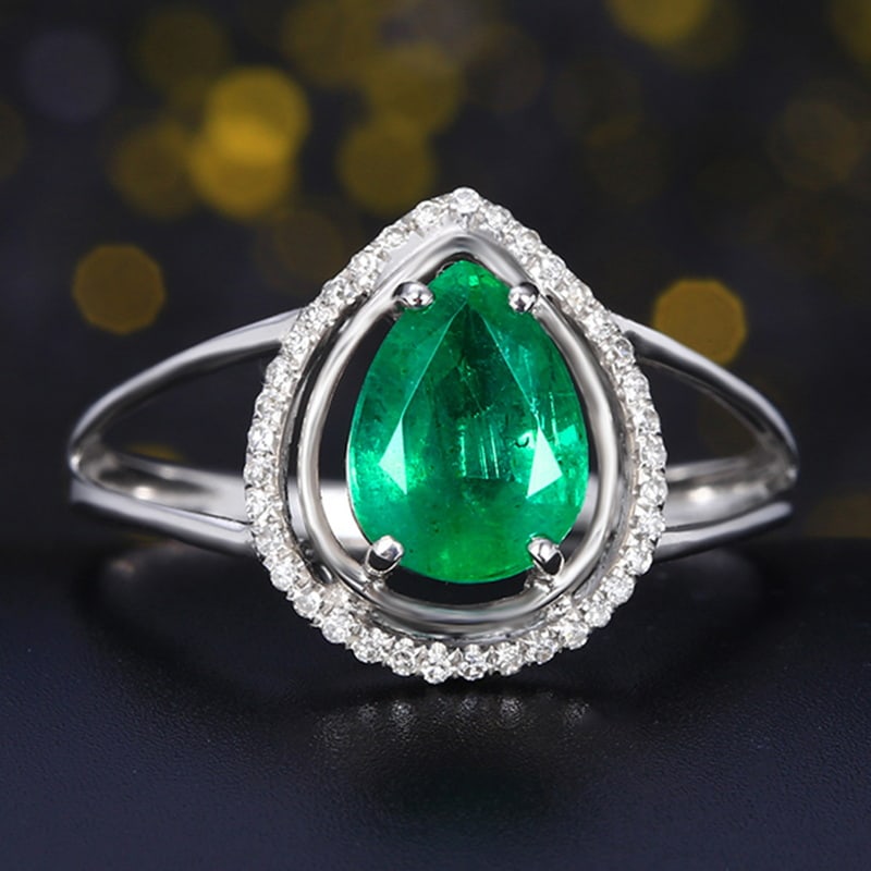 14k Gold 1.85 Ctw Vivid Green Natural Emerald & Diamond Ring: Ref:230939104 // gold content:14k gold // ring size:7. 25us // // main gemstone:emerald // shape:pear // carat weight:1. 77ct // color:vivid green // treatment:natural // // adjacent gemstone 2 :