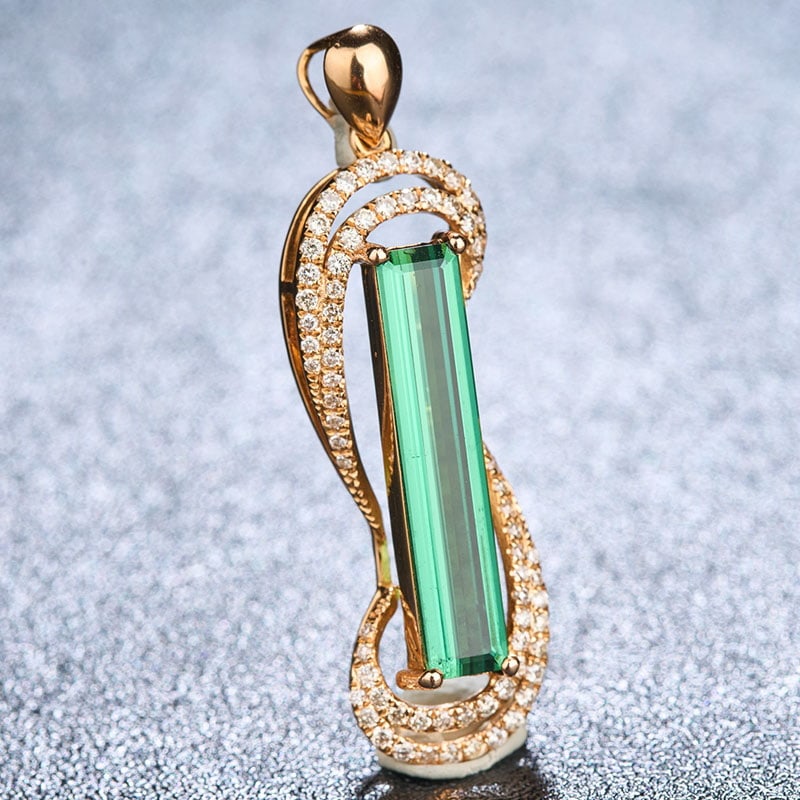 14k Gold 2.51 Ctw Natural Tourmaline & Diamond Pendant( Without Chain ): Ref:230939111 // gold content:14k gold // ring size:7. 25us // // main gemstone:tourmaline // shape:octagonal // carat weight:2. 19ct // color:green // treatment:natural // // adjacent gemstone 2