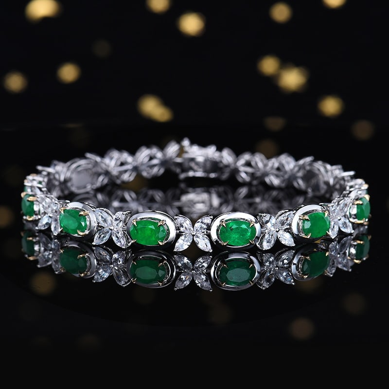 14k Gold 8.44 Ctw Vivid Green Natural Emerald & Sapphire Bracelet: Ref:230939118 // gold content:14k gold // main gemstone:emerald // shape:oval // carat weight:4. 6ct // color:vivid green // treatment:natural // // adjacent gemstone 2 : sapphire // number of stones: