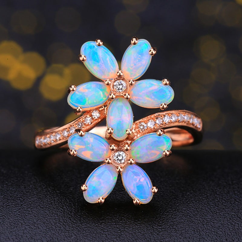 14k Gold 1.78 Ctw Natural Opal & Diamond Ring: Ref:230939124 // gold content:14k gold // ring size:7. 25us // // main gemstone:opal // shape:oval // carat weight:1. 66ct // color:white // treatment:natural // // adjacent gemstone 2 : diamond // nu