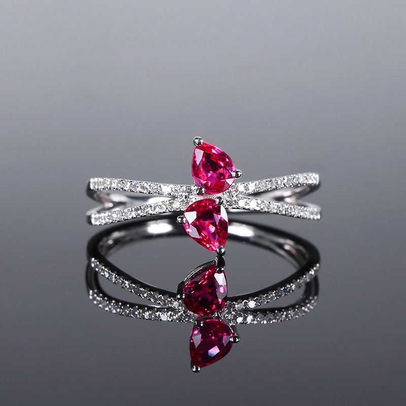 14k Gold 0.77 Ctw Natural Ruby & Diamond Ring: Ref:230939144 // gold content:14k gold // ring size:7. 25us // // main gemstone:ruby // shape:pear // carat weight:0. 63ct // color:red // treatment:natural // // adjacent gemstone 2 : diamond //