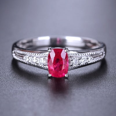 14k Gold 0.72 Ctw Natural Ruby & Diamond Ring: Ref:230939183 // gold content:14k gold // ring size:7. 25us // // main gemstone:ruby // shape:cushion // carat weight:0. 61ct // color:red // treatment:natural // // adjacent gemstone 2 : diamond // s