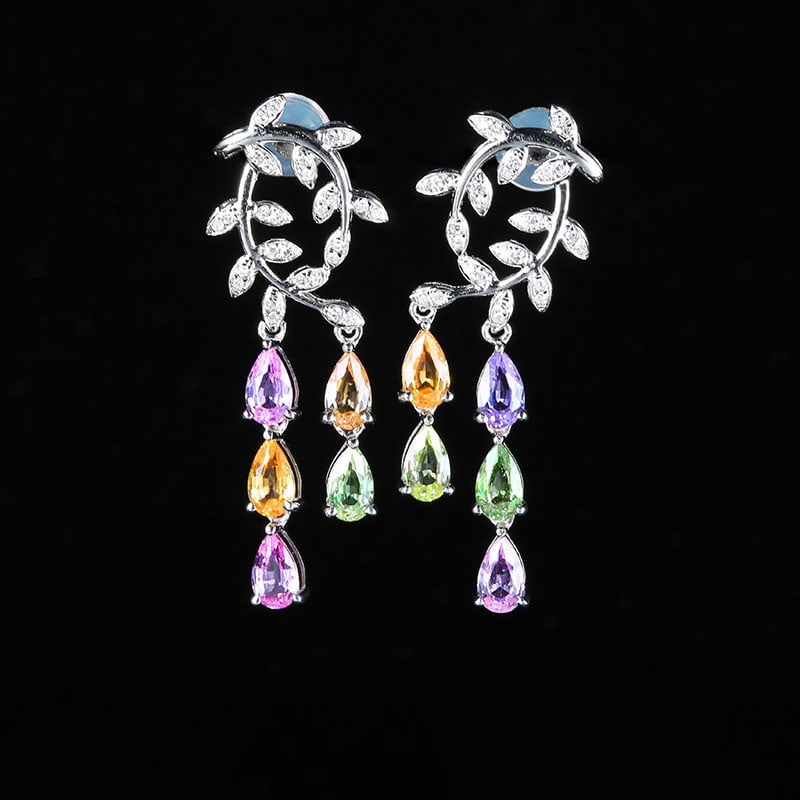 14k Gold 2.62 Ctw Natural Sapphire & Diamond Earrings: Ref:230939187 // gold content:14k gold // main gemstone:sapphire // shape:pear // carat weight:2. 45ct // color:color // treatment:natural // // adjacent gemstone 2 : diamond // number of stones:56 //